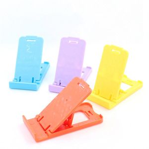 Supporti universali per mini telefoni cellulari Supporto pieghevole in plastica regolabile compatto per iPhone cellulare Accessori per cellulari Tablet display da scrivania portatile