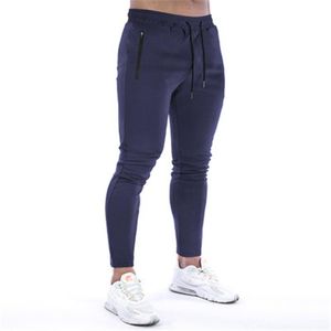 Męskie Solid Color Skinny Spodnie Moda Trend Elastyczność Hip Hop Sznurek Długie Spodnie Wiosna Mężczyzna Nowa Fitness Deskorolka Casual Slim Spodnie