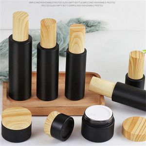 Black Frosted Glass Cosmetic Bottle Empty Cream Jars Spray Lotion Pump Bottles Refillable Container Package with Wood Grain Plastic Lids