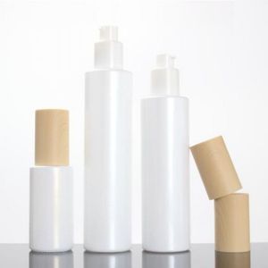 2021 100mlパールホワイトの空のガラスポンプクリームボトル化粧ローション香水スプレー収納容器の瓶が付いている木製の穀物キャップ