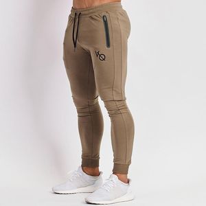 Calça de moletom fitness Jogger de grife calças de ginástica para musculação masculinas de algodão da moda com vários bolsos calças de jogging para treinamento de musculação