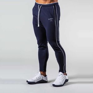 Sida randig jogging byxor män bomull sport sweatpants träning byxor gym träning byxor atletisk smal passform körbyxor x0628