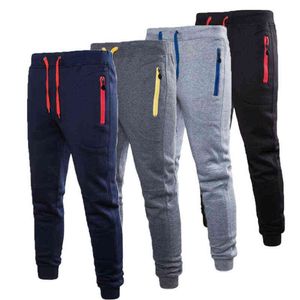 Novos 2020 Homens Ginásio Desporto Desporto Corredores Tracksuit Casual Calças Longas Calças Sólidas Com Bolsos Drawstring Cintura Sweatpants M-3XL H1221