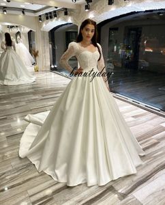 Marfim manga longa vestido de casamento lace cetim tamanho grande photoshoot colher pescoço decote vestido de nupcial sheer decote varrer trem médio leste árabe estilo frisado