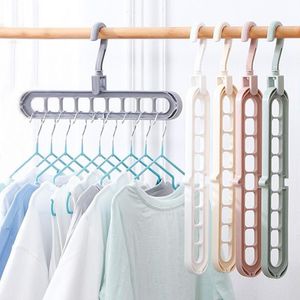 9 fori Magic Hanger Armadio Organizzatore Spazio Saving Hanger Abbigliamento multi-porto Abbigliamento Sciarpa in plastica Cabina di stoccaggio Ganci per i vestiti