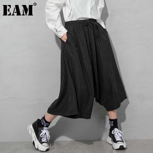 [EAM] 높은 탄성 허리 블랙 스트라이프 캐주얼 하렘 바지 새로운 느슨한 맞는 바지 여성 패션 조류 봄 가을 2021 1DD6968 Q0801