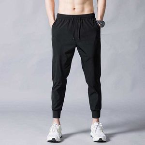 Queda dos homens doodle preto imprimir calças corredor calças masculinas soltas casuais fitble fitness sweatpants tamanho grande suor calças x0723