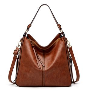 Kvinnors väska 2024 Nya europeiska och amerikanska mode retro tygväska kvinnor avslappnad stor handväska axel diagonal shoppare väskor