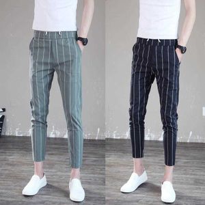 Spółka Społeczne Facet Casual Spodnie męskie Koreańskie Spodnie Slim Spodnie Moda Pionowe Paski Spodnie Lato X0723