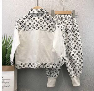 Novo inverno infantil infantil infantil camisa de camisa de menino casacos designers frios com calças de bolso de bolso calça de duas peças esportes