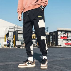 Męskie Multi Kieszenie Streetwear Spodnie Cargo Harem Spodnie Hip Hop Casual Male Joggers Track Spodnie 2020 Nowe Mężczyźni Harajuku Spodnie X0615