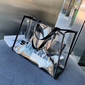Axelväskor Summer Big Bag Dame 2021 Wild Transparent Handväska med stor kapacitet Klar Letter Shopper Förvaring