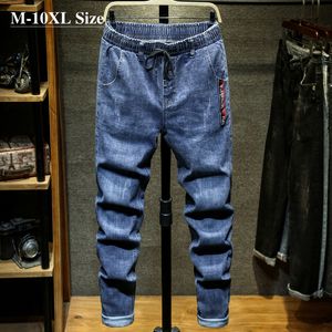 Plus size 7xl 8xl 9xl 10xl homens de moda jeans streetwear harem calças de bolso grande estiramento casual denim calças macho marca 210318