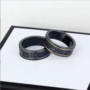 2021 Высококачественный экстравагантный простой сердечный кольцо кольцо золото розовые цвета из нержавеющая сталь кольца кольца модные женщины -дизайнерские ювелирные ювелирные изделия.