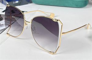 Nuovi occhiali da sole dal design alla moda 0252 montatura grande quadrata in metallo con montatura cava occhiali decorativi di colore chiaro di alta qualità popolare stile estivo
