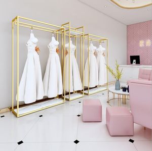 Bröllopsklänningsställ högkvalitativ displayram Kommersiella möbler golvtyp guld speciella studioklänningar hylla järn klädbutik klädställ