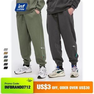 Inflação lã solta apto homens de moletom na cor pura inverno elástico cintura streetwear calças exteriores 3206W 210715