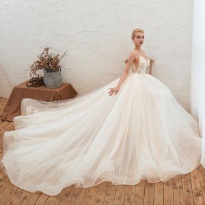 Abito da sposa Boho di design Una linea Perline illusione Appliqued di pizzo Abiti da sposa da spiaggia estiva Abiti da matrimonio sexy senza schienale per signora Robe de mari￩e