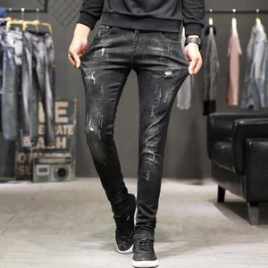 Европейский стиль мужские джинсы повседневная красота женщины печатать мужчины джинсовые брюки черные тонкие карандаш брюки