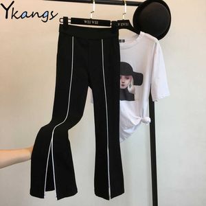 Kobiety w dużych rozmiarach Elastyczne spodnie z wysokim talią moda Spring odcinek długie spodnie czarny kontrast kolor biały podzielony szczupły spodni 210619