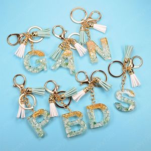 Mode 26 A-Z Buchstaben Harz Schlüsselanhänger für Frauen Goldfolie Tasche Anhänger Charms Handtasche Zubehör Quaste Schlüssel Ringe Geschenk