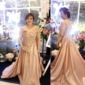 2021 Sexy Champagne Arabic Plus Size Mother Of The Bride Dresses Jewel Neck Illusion Long Sleeves Crystal Beading Floor Length Evening Gowns Wedding Guest Dress