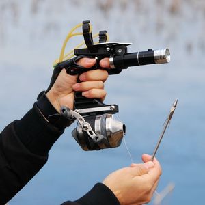 Wholesale slingshot fishing reel for sale - Group buy New Fishing Set Slingshot Hunting Catapult Suit Outdoor Shooting Fishing Reel Darts Protective Gloves Flashlight Tools