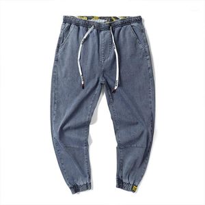 Jeans da uomo Moda Streetwear Uomo di grandi dimensioni M-7XL Pantaloni cargo in denim Pantaloni larghi con fondo Hip Hop Harem sottile