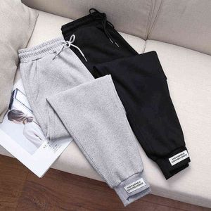 Calças esportivas Mulheres Sweatpants Soltas Patchwork Calças Coreanas Harem Calças Plus Size Feixe Pés Casual Bolso Calças de Cintura Alta Y211115