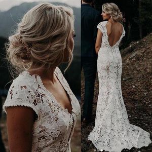 Bohemian Lace Bröllopsklänningar Landstil Deep V Neck Mermaid Bridal Gowns Cap Sleeve Backless Robes de Marie Plus Storlek