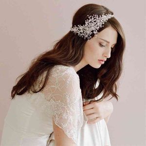 結婚式のヘアジュエリーのアクセサリーを売る花嫁の手作りのヘッドドレススタイル美しいクリスタルバンドブライダル