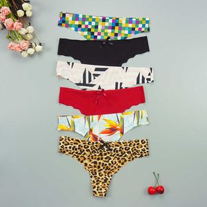 6pcs / massor sexiga kvinnor thongs trosor sömlösa tangas trosor super tunn intim leopard sträng is silke låg resa panty underkläder 210720