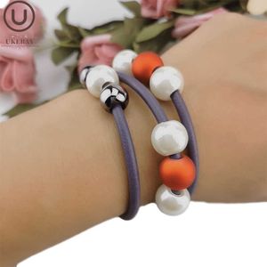 UK Nowe Fioletowe Gumowe Bransoletki Kobiety Charm Pearl Bangles 6 Kolory Handmade Prezent Bransoletka Klasyczna Biżuteria Elastyczność Łańcuchy Q0719