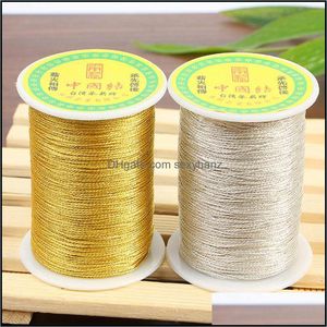 Fios de tecido de tecido vestuário um carretel metálico ouro nylon twine fio cordão jóias beading beading cordão trançado entrega 2021 lqqgv