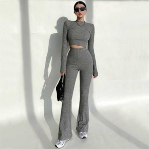 Women High Neck Ribbed Crop Top And Stretch Waist Flare Rrousers Co-ord 211106