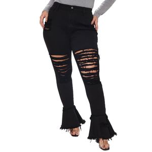 Kobiety dżinsy w dużych rozmiarach jesień zimowe ubrania podarte dziury dżinsowe spodnie większe rozmiary 3xl 4xl 5xl Flare Pants Modna Masowa Niebieska Bottom Leggings 5635