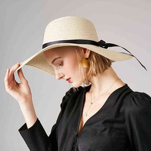 2020新しい女性の麦わら帽子夏の大きいワイドブリムビーチハットの屋外のビーチの帽子の韓国語版の野生の太陽の帽子折りたたみ式抗UV G220301