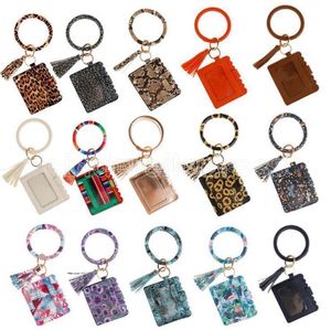 Leather Handbags For Ladies venda por atacado-2021 Saco de desenhista de Hot Wallet Leopard Impressão PU Bracelete de Couro Keychain Cartão de Crédito Carteira Carteira Borlas Borlas Chaveiro Bolsa Senhora Acessórios C0114