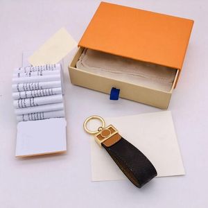 2021 Keychain Key Chain Buckle Keychains Lovers Car Handmade Leather Men Women Bags Pendant Accessories 2 Color 69000 with box dust bag