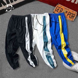 Męskie joggers casual spodnie fitness mężczyźni sportswear dnie dnie chudy spodnie spodnie spodnie siłowni list drukarka 210715