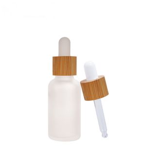 Frostat Clear Glass Dropper Bottle Bamboo Cap Kosmetiska Förpackningsglasögon Essential Oljeflaskor 20 30 50 100 ml