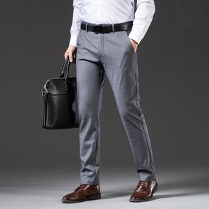 22SS Mężczyzna Garnitur Spodnie Dżinsy Marka Zimowe Mężczyźni Płukany Design Casual Slim Lightweight Stretch Pant S Straight Tech Fleece Business Spodnie wypoczynkowe Najwyższej jakości W28-W40
