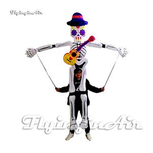 Concert Stage Performance Walking Inflatable Skeleton Ghost Costume Carrying A Guitar 3.5m Blow Up Skull Man Puppet Suit For Halloween Parade And Music Festival