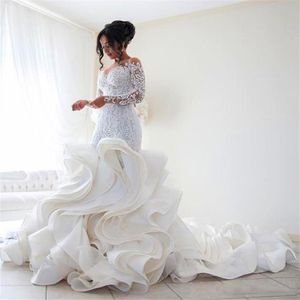 Taglie forti Moda Abito da sposa a sirena Arrivo Pizzo Manica lunga Musulmano Vestido De Noiva Appliques romantiche Abiti con volant