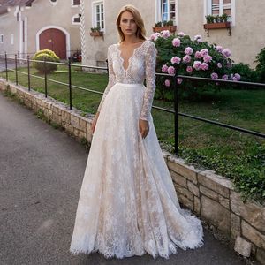 Nowa koronkowa sukienka ślubna z długim rękawem 2021 Światło ślubne Szampan V-Neck Backless Beach Bride Gown Vestidos de Noiva Mairege