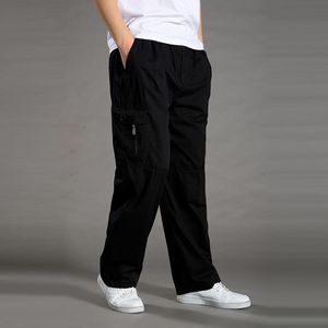 Moda mężczyźni swobodni spodnie elastyczne talia wielokrotne spodnie męskie wyposażenie workowatego prostego ładunku joggera duży rozmiar 6xl
