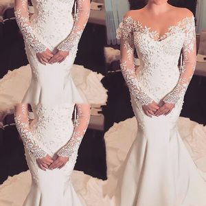 Wdzięku koronki z długim rękawem Mermaid Suknia ślubna 2021 Sąd Pociąg vintage suknie ślubne Satin Ivory Illusion Bride Suknie Vestidos De Novia