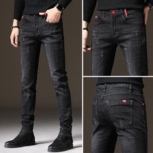Herr jeans märke män smal passande mager denim designer elastiska raka stretch byxor för
