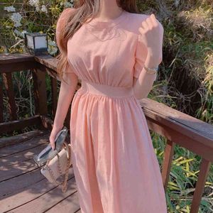 South Korean chic sweet pink age-reducing round collar back straps hollow back-to-back waist bubble sleeve dress long 210429