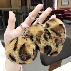 Portachiavi Leopard Stampa Pompon Keychain Fluffy Faux Fur Ball Portachiavi Anello Protezione a forma di cuore per le donne Borsa Pendenti SP2480